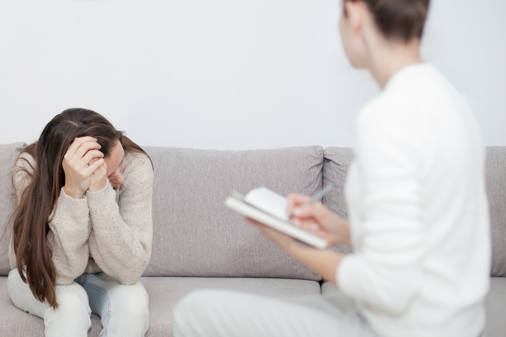 A young woman at the therapy session, psychology, therapist, psychoanalitic, depression, emotions