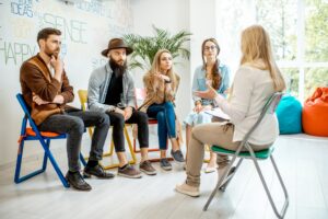 Group of people during the psychological therapy indoors